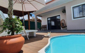 Casa na Praia do Sonho com Piscina e Jardim.